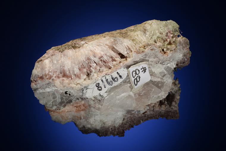 NATROLITE with PREHNITE, ANALCIME and COPPER in CALCITE